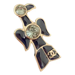 Chanel blue steel pins & brooches