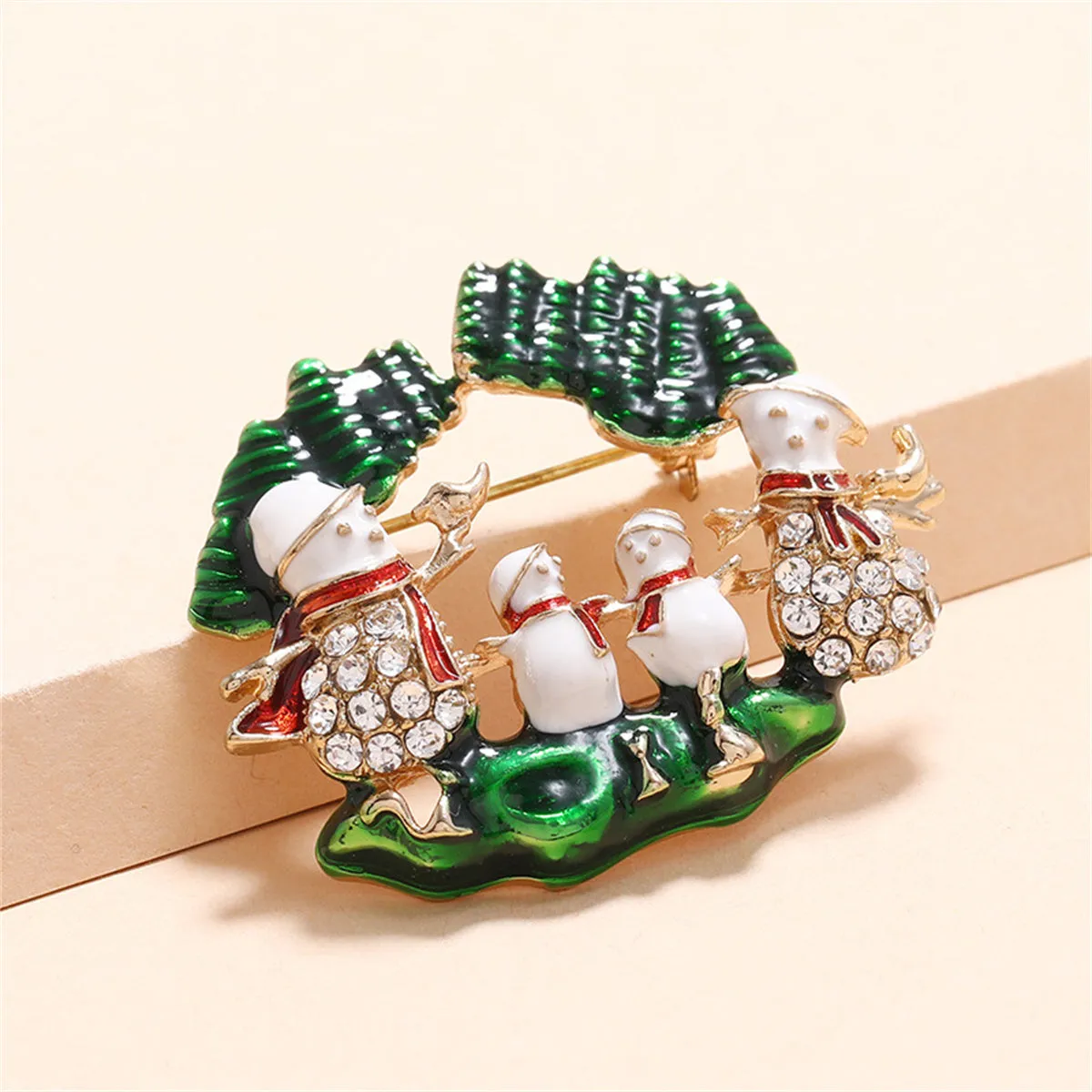 Cubic Zirconia & Green Snowman Family Brooch
