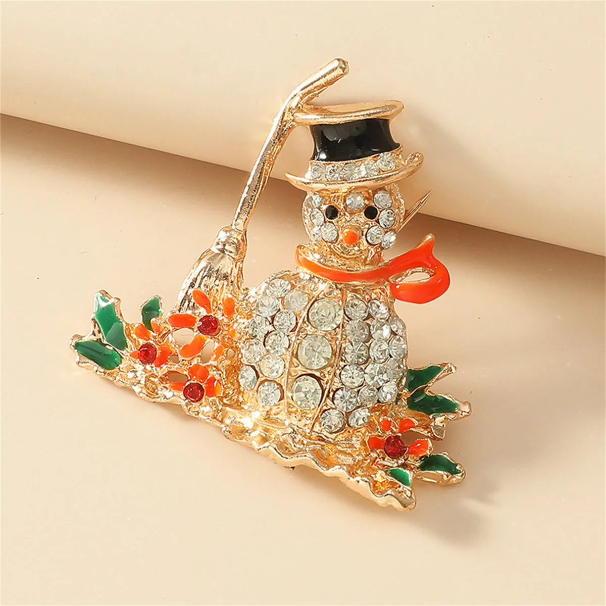 Orange Enamel & Cubic Zirconia Broom Snowman Brooch