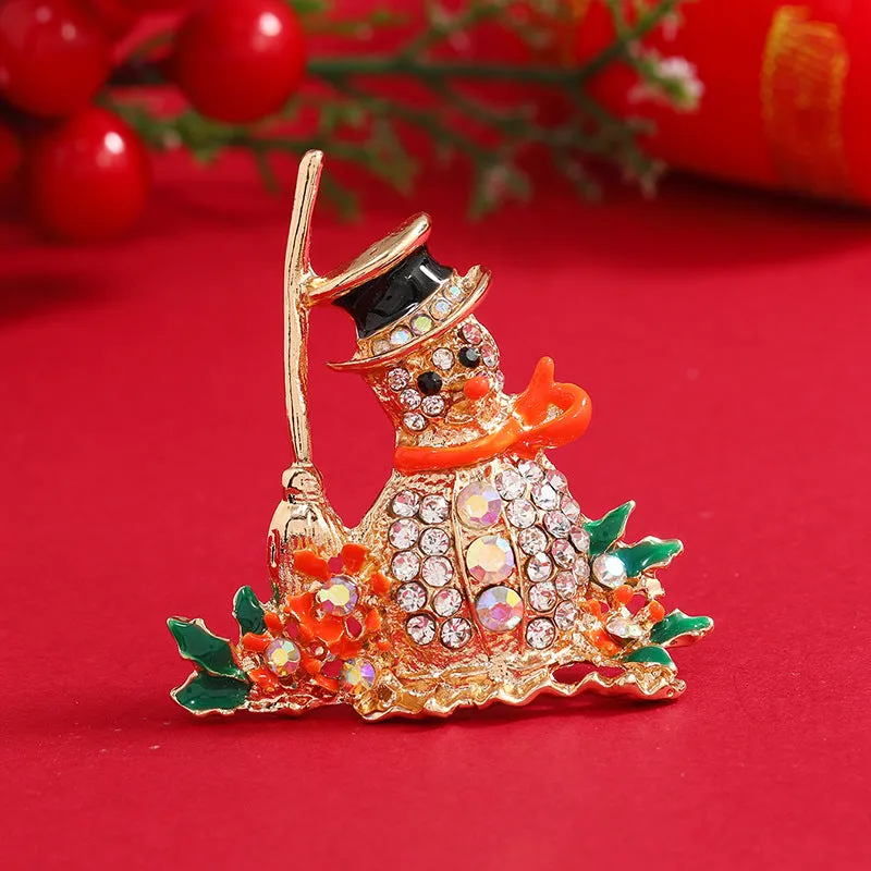 Orange Enamel & Cubic Zirconia Broom Snowman Brooch