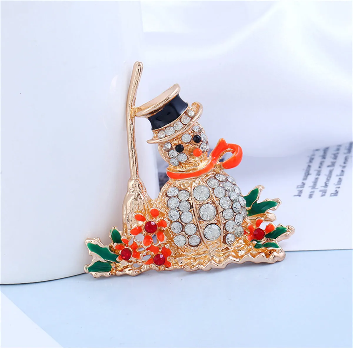 Orange Enamel & Cubic Zirconia Broom Snowman Brooch