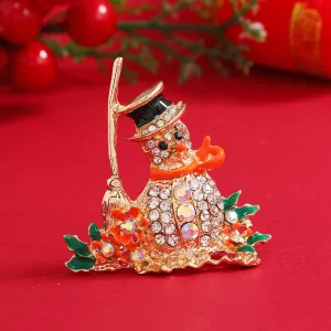 Orange Enamel & Cubic Zirconia Broom Snowman Brooch