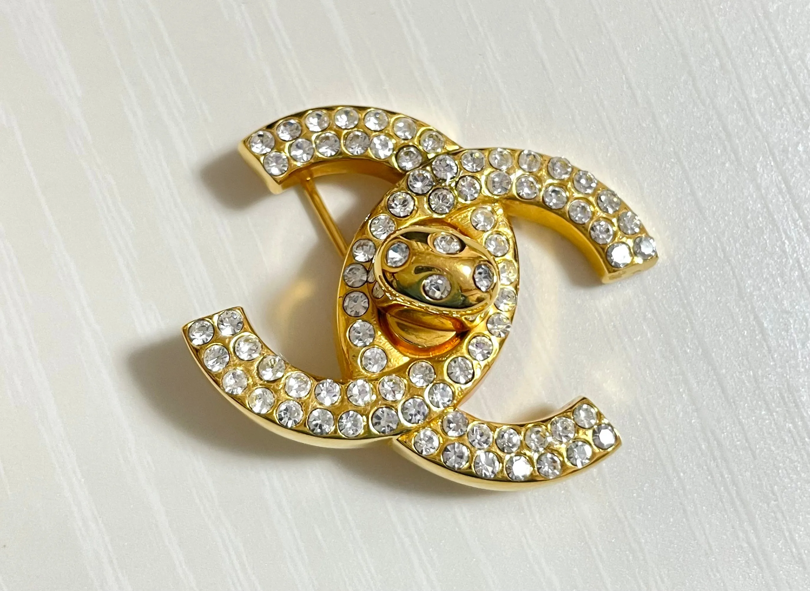 Vintage CHANEL golden turn lock CC pin brooch with crystals. Very classic and popular jewelry. Coco mark brooch. 0411251
