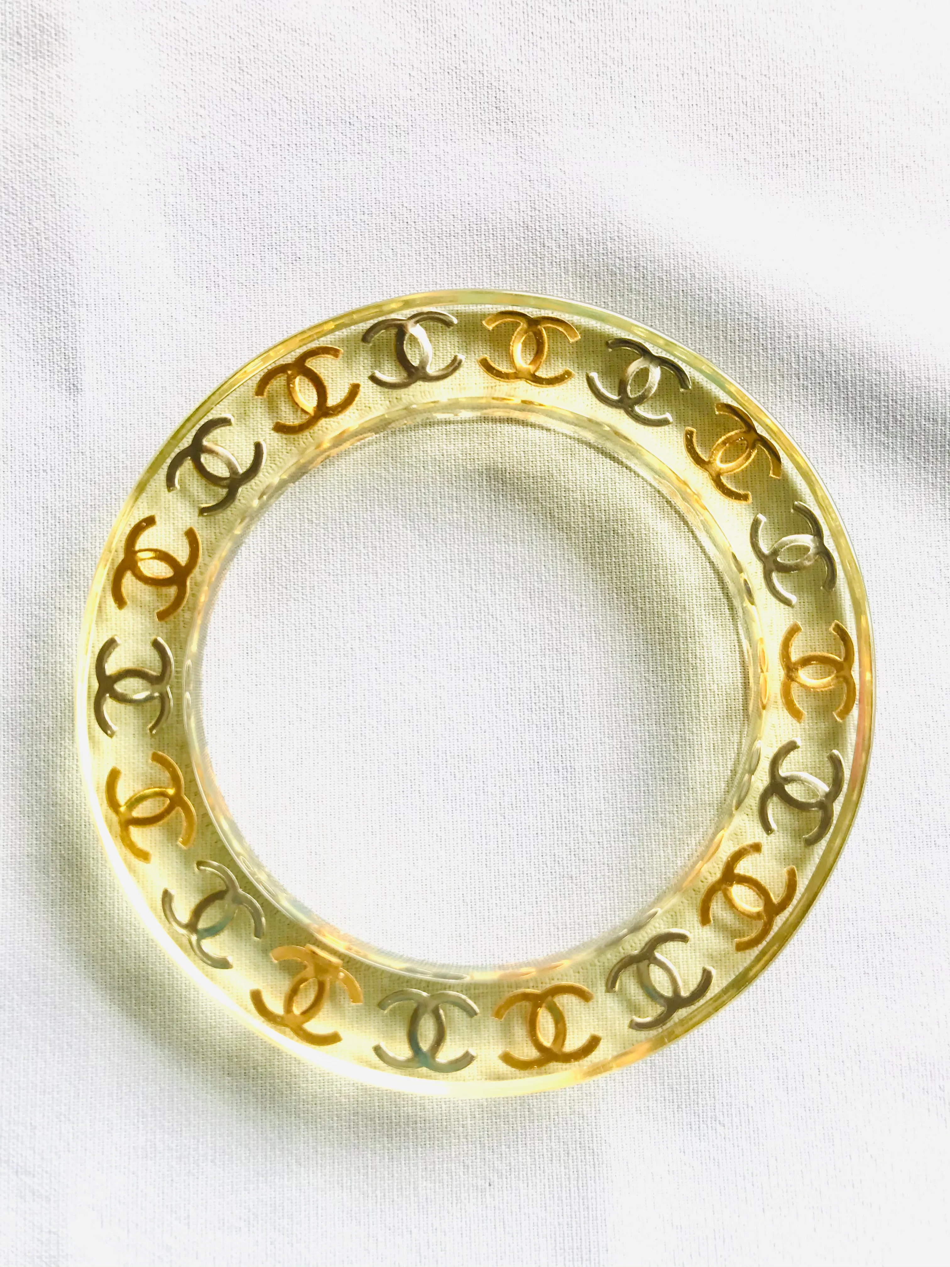 Vintage CHANEL resin bangle, bracelet with gold and silver CC marks. One of a kind jewelry piece. 050323re7