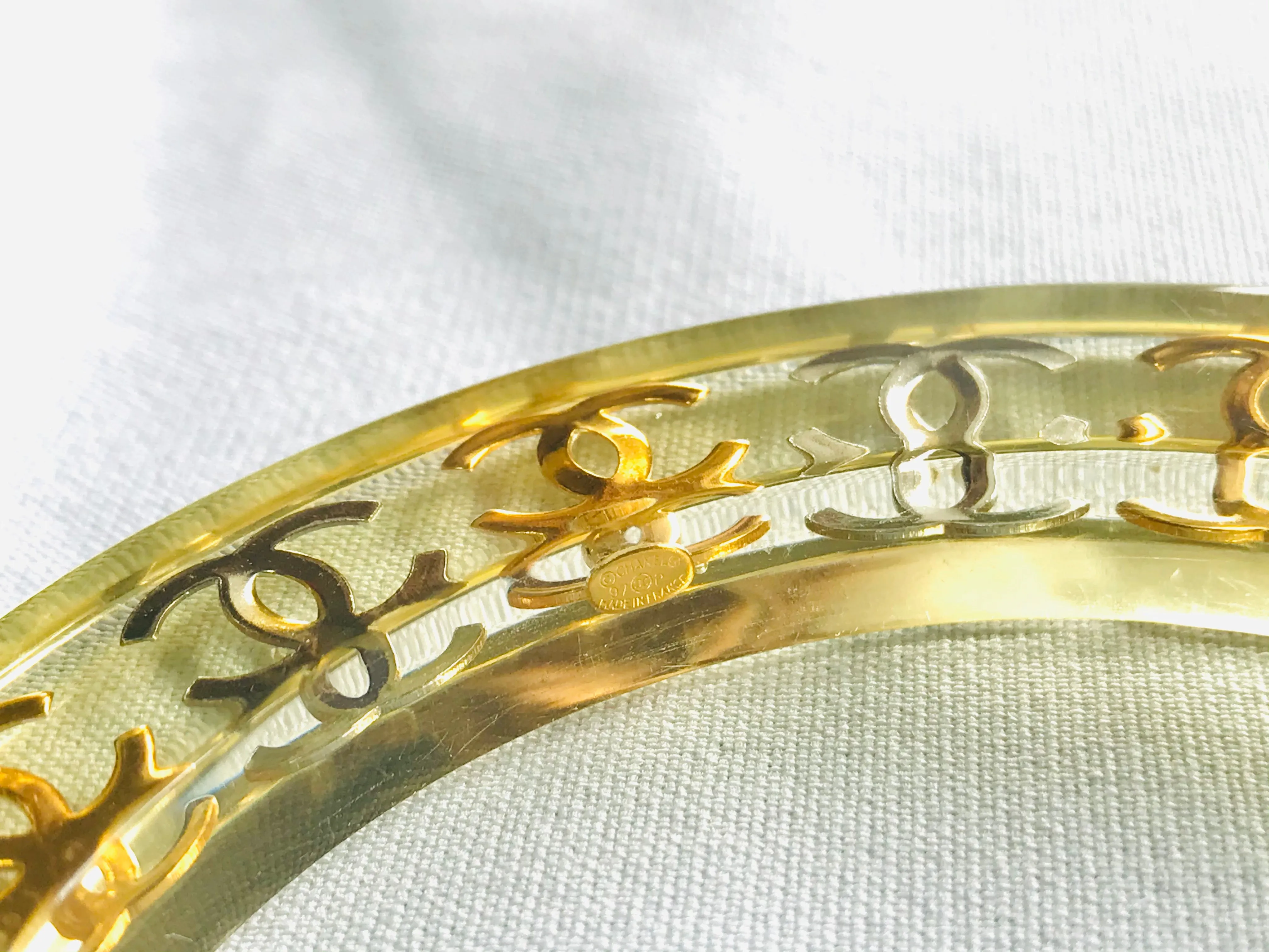 Vintage CHANEL resin bangle, bracelet with gold and silver CC marks. One of a kind jewelry piece. 050323re7