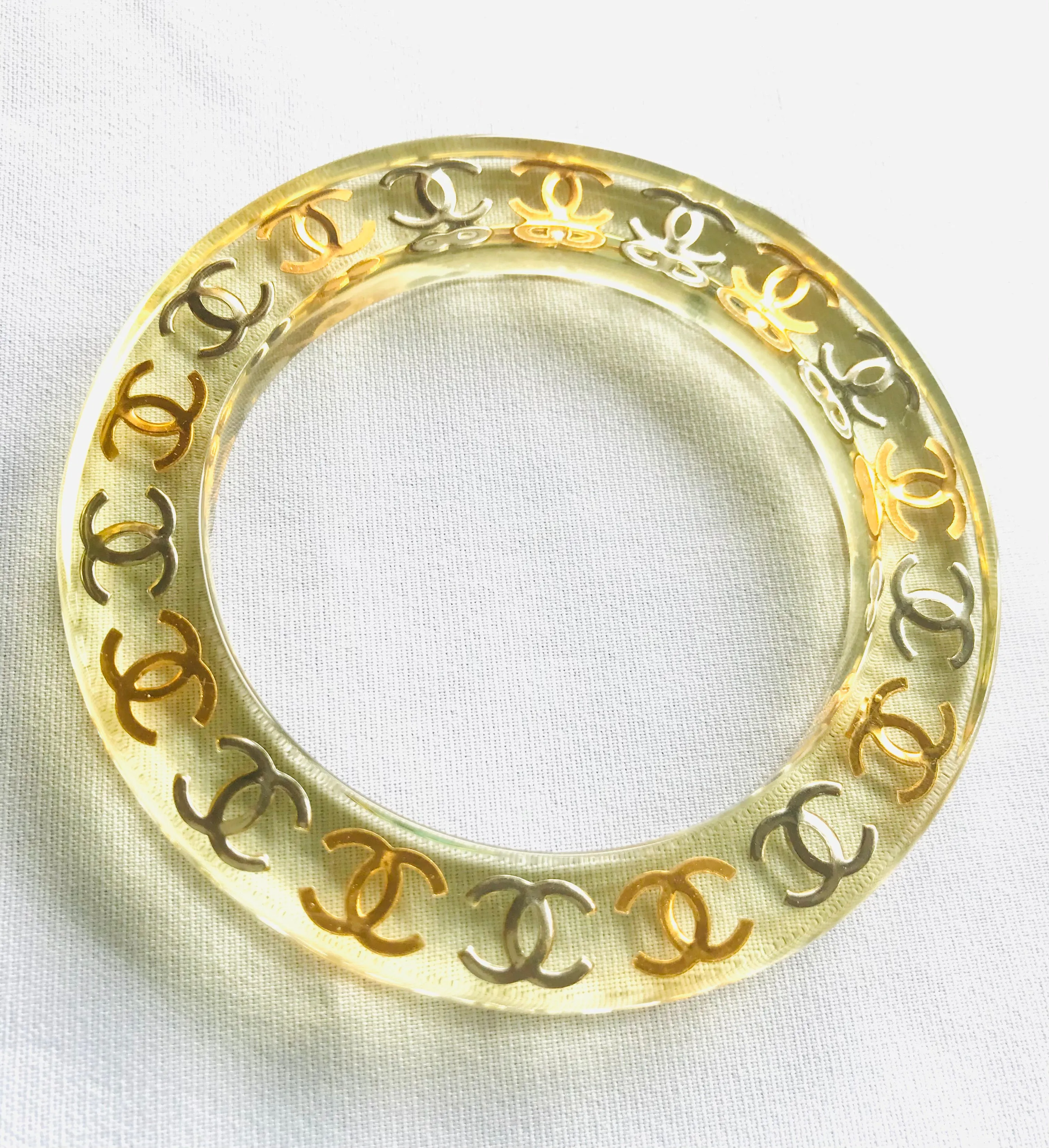 Vintage CHANEL resin bangle, bracelet with gold and silver CC marks. One of a kind jewelry piece. 050323re7