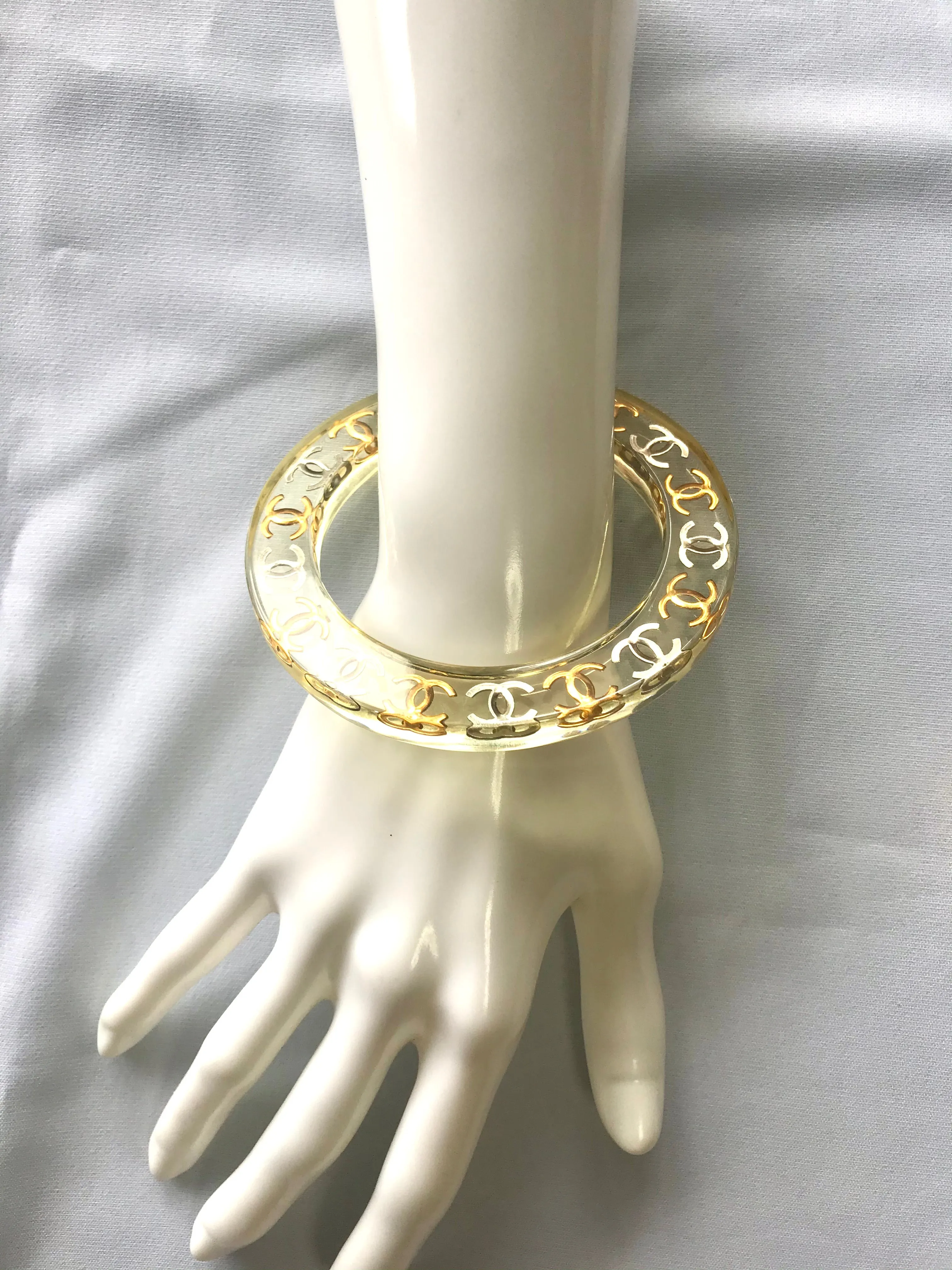 Vintage CHANEL resin bangle, bracelet with gold and silver CC marks. One of a kind jewelry piece. 050323re7