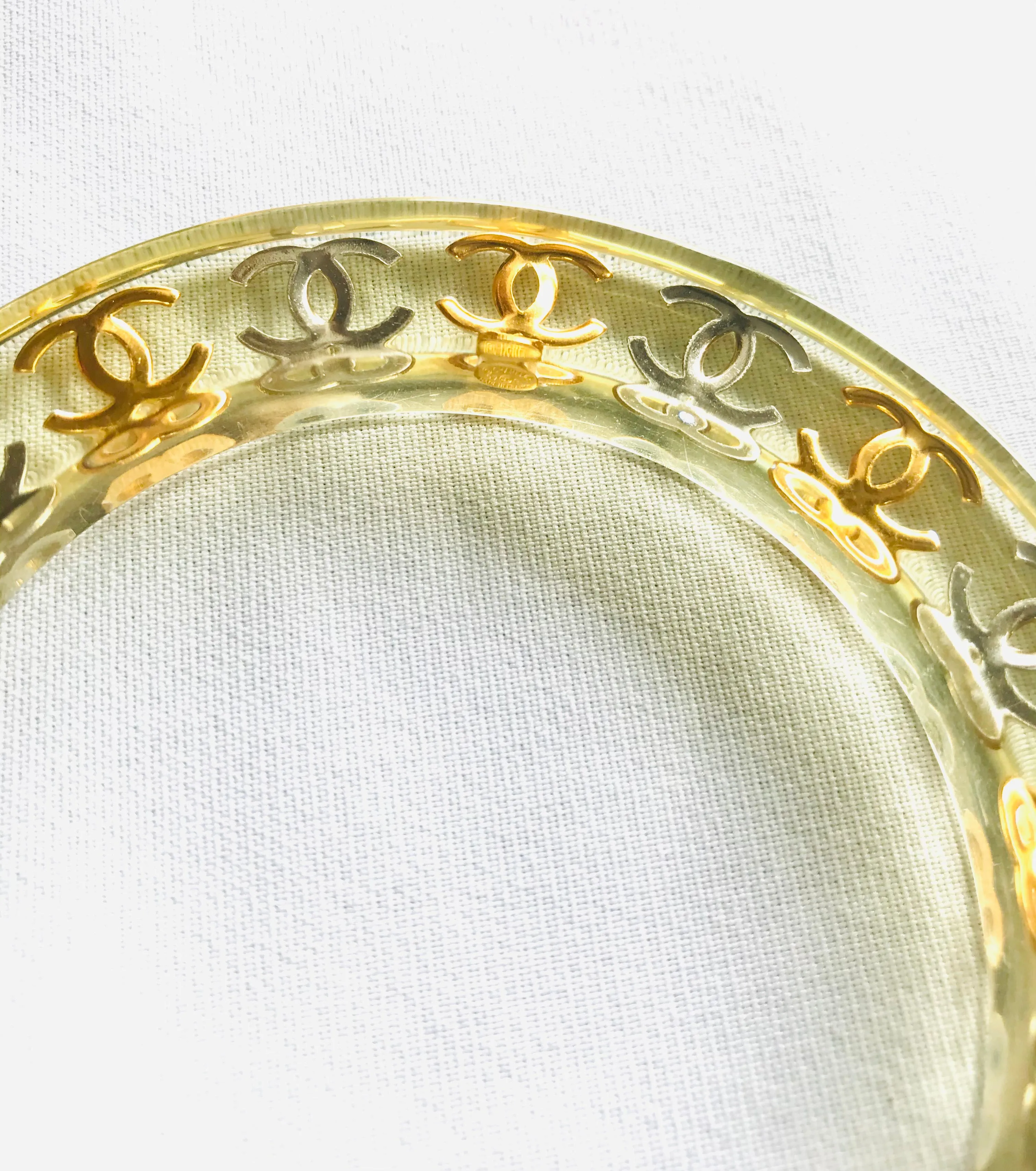 Vintage CHANEL resin bangle, bracelet with gold and silver CC marks. One of a kind jewelry piece. 050323re7